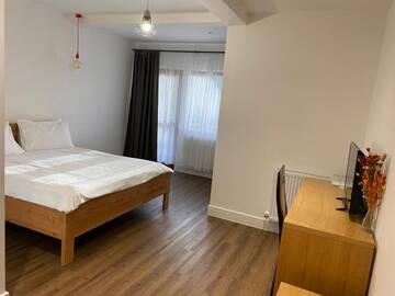 Фото номера Двухместный номер с 1 кроватью и балконом Отель Podina Resort г. Ungureni 4